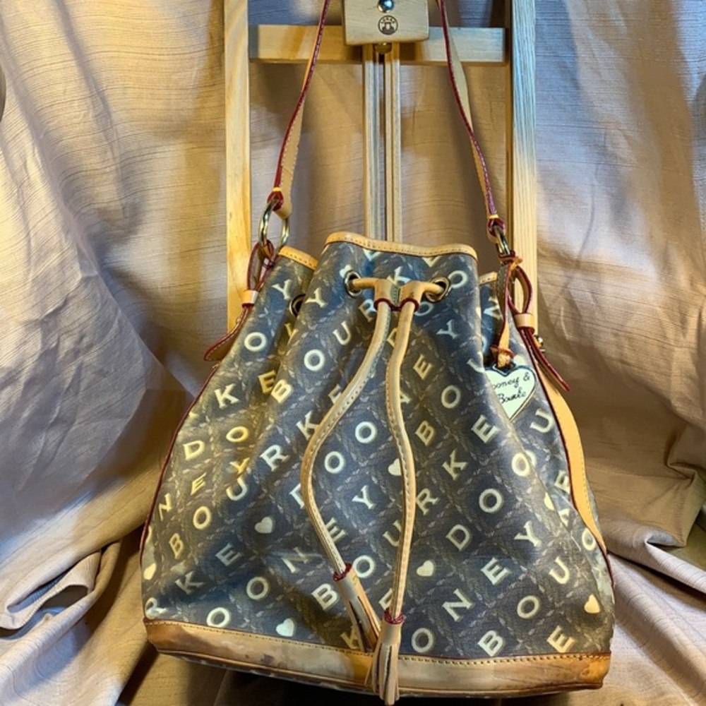 Dooney & Bourke draw string bucket shoulder bag